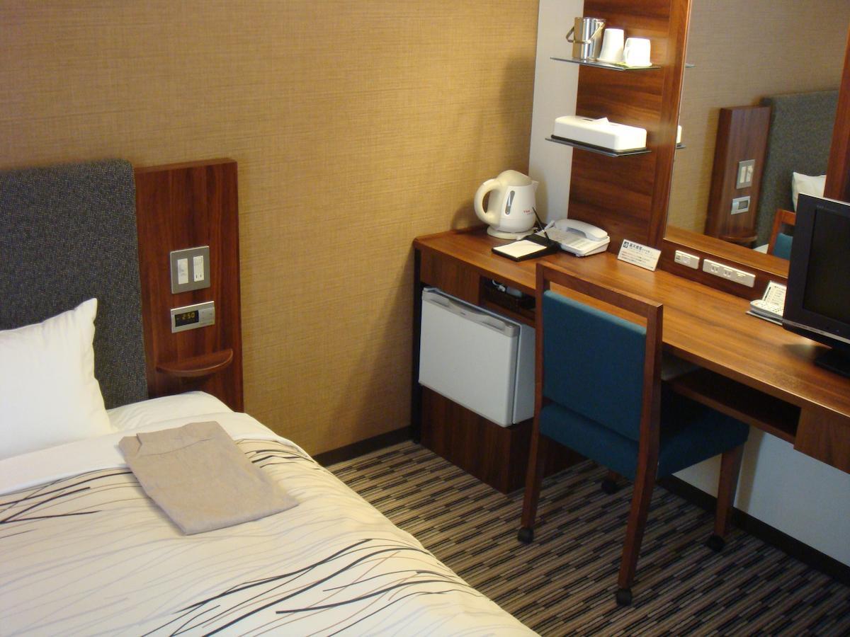 Uozu Manten Hotel Ekimae Quarto foto