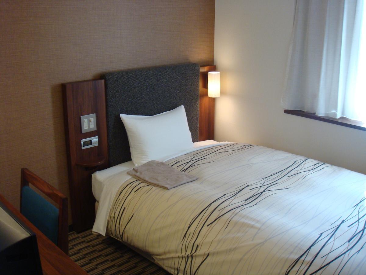Uozu Manten Hotel Ekimae Quarto foto